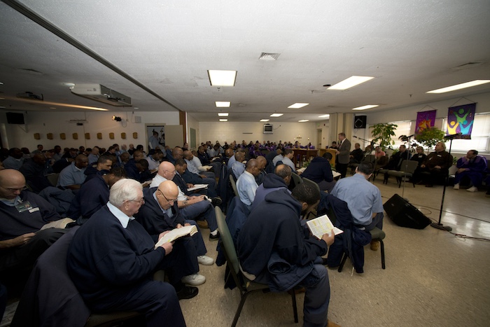 Mike Swiger speaks at a ministry event